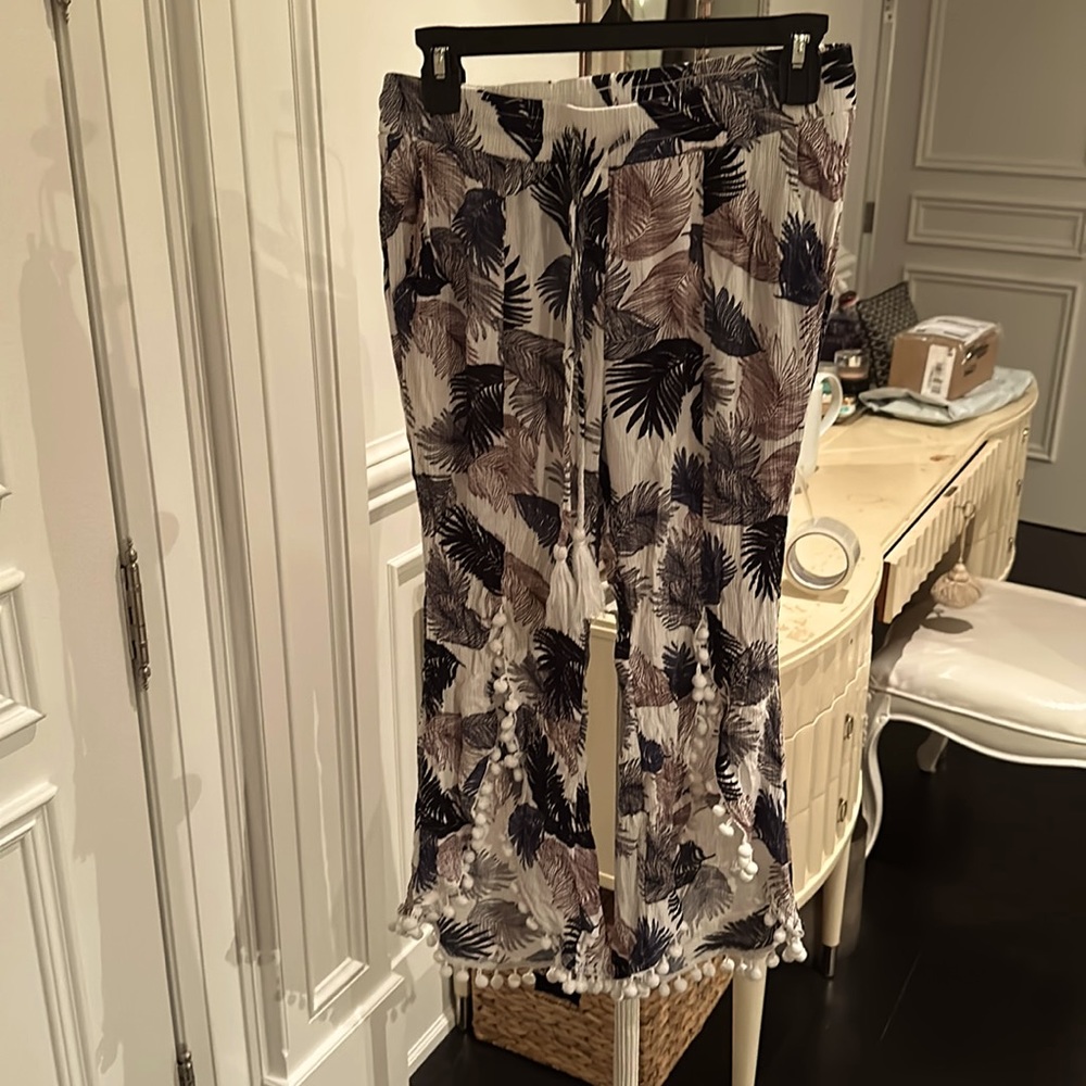 Solitaire swim pants size M .  100 percent rayon